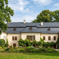 Kaštieľ Okoličániovcov (Okolicsányiovcov) v Brzotíne v roku 1917 Kaštieľ Okoličániovcov v Brzotíne